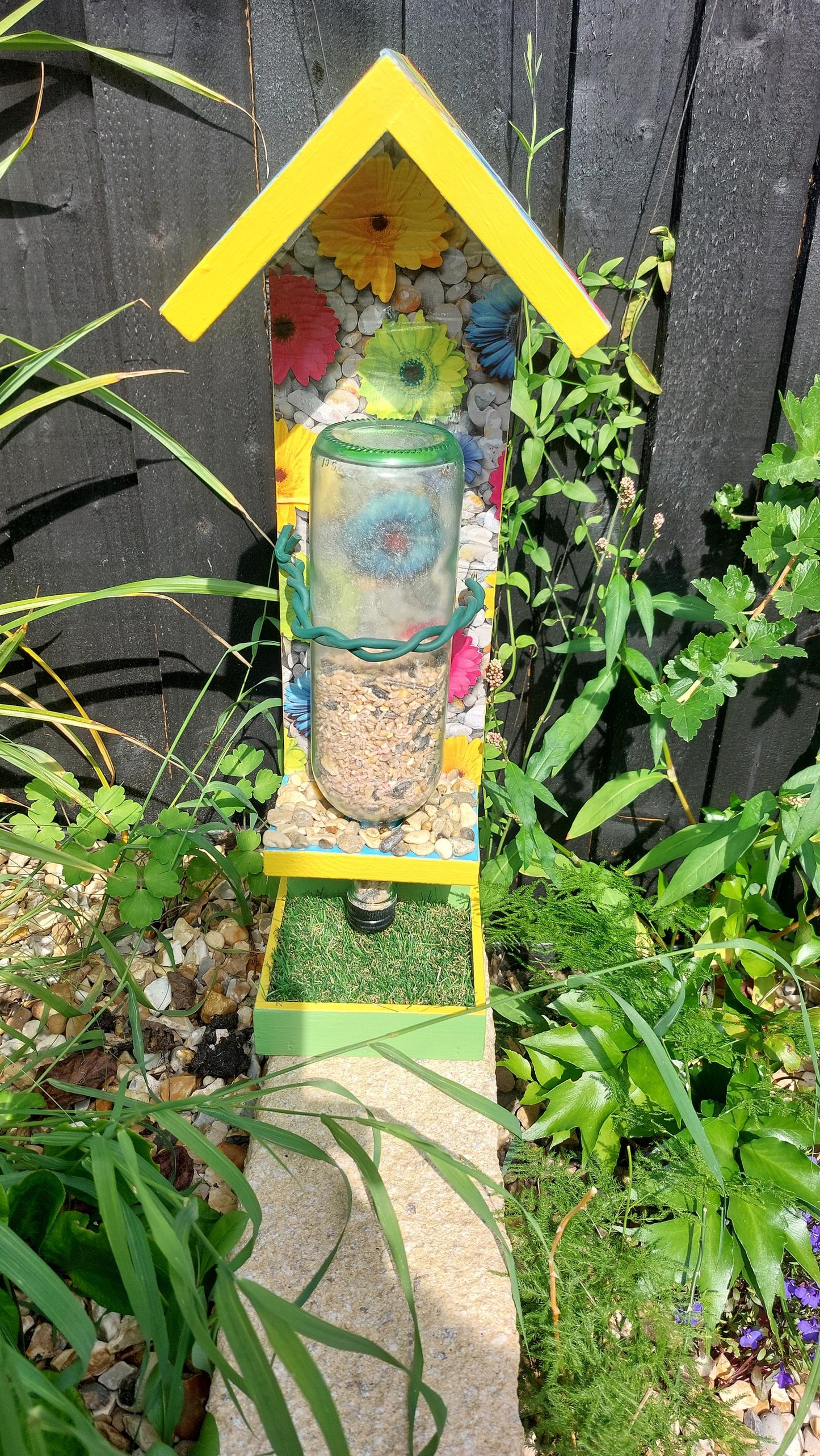 bright colourful bespoke wooden bird feeder
