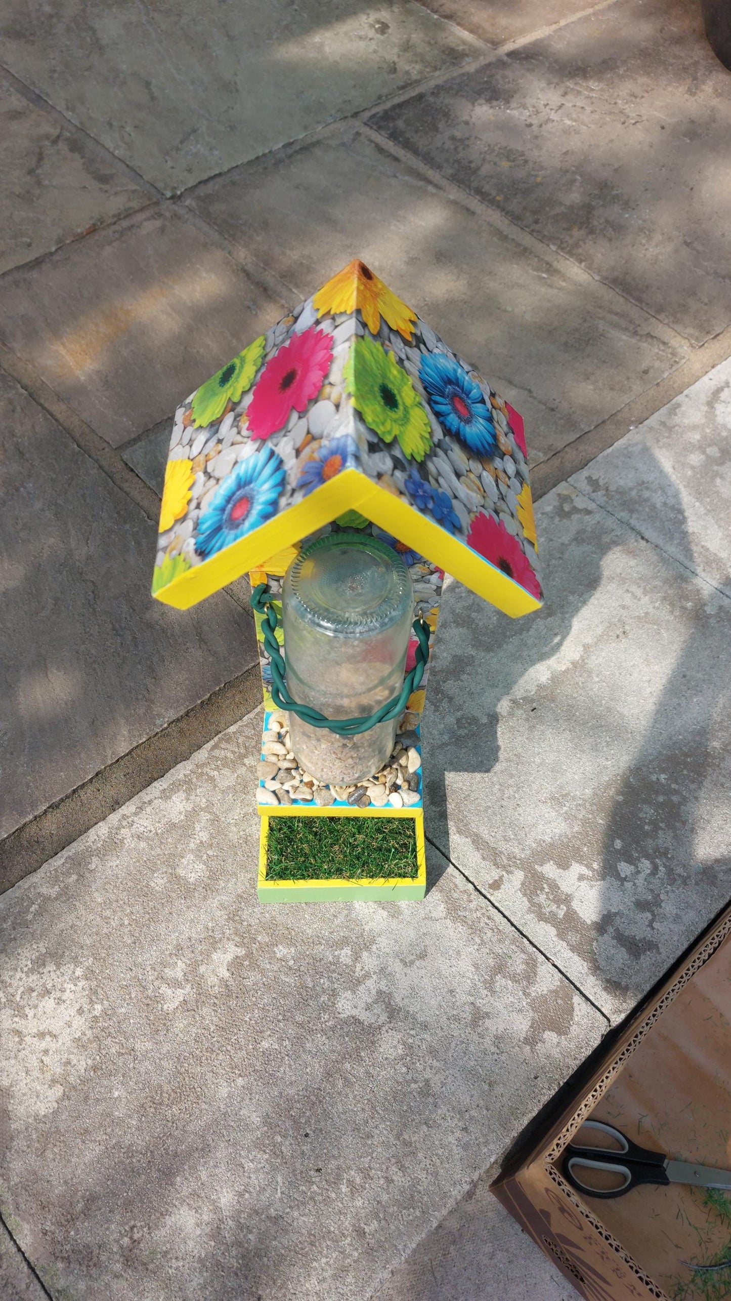 bright colourful bespoke wooden bird feeder