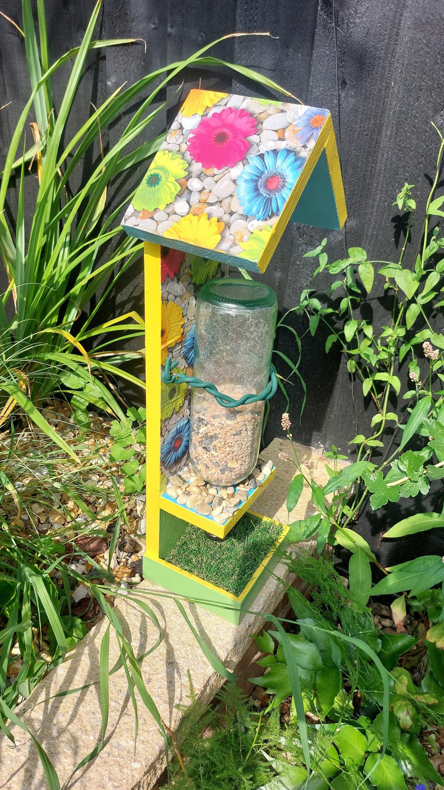 bright colourful bespoke wooden bird feeder
